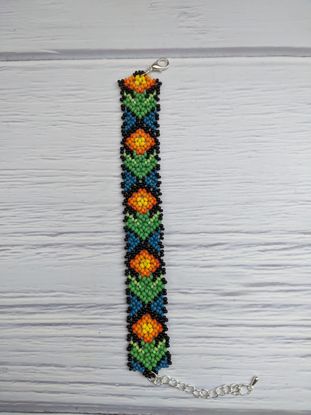 Handmade Beaded Floral Bracelet in Green, Orange & Blue